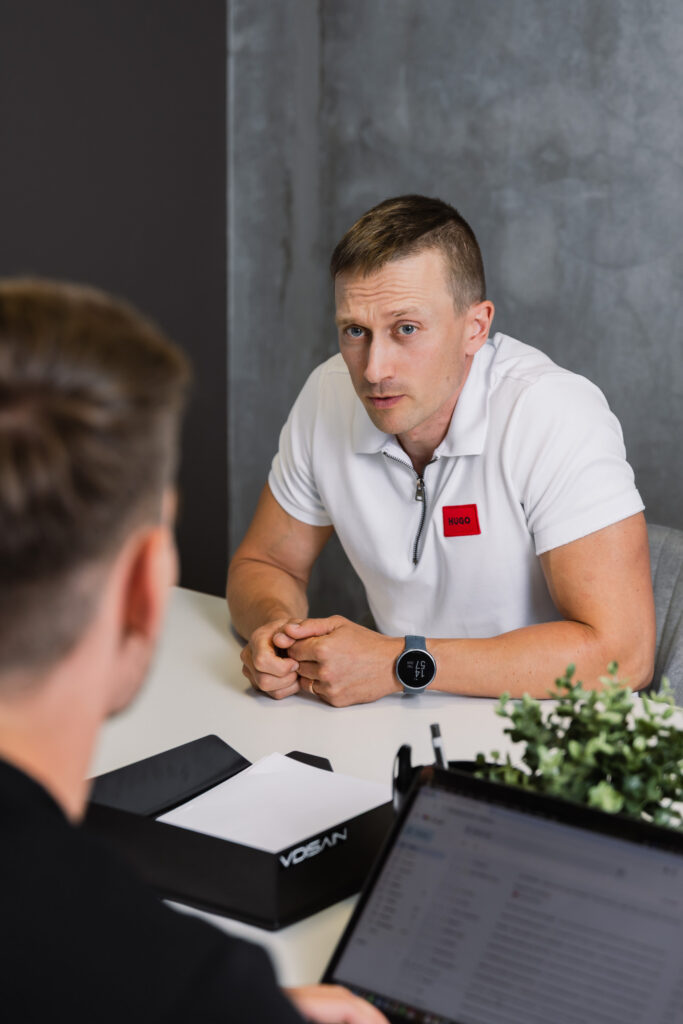 SW Ventures salesperson handling objections in sales during a client meeting using the LAER method